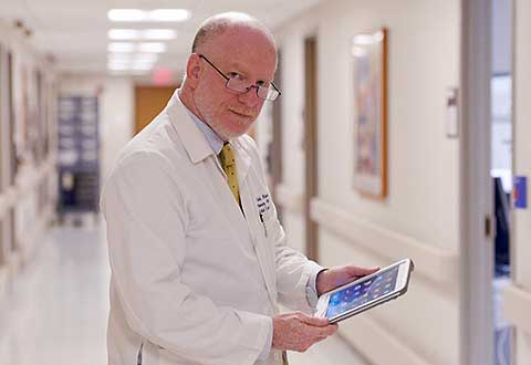 Dr. Charles Atwood can now access patient information anywhere with his new iPad.